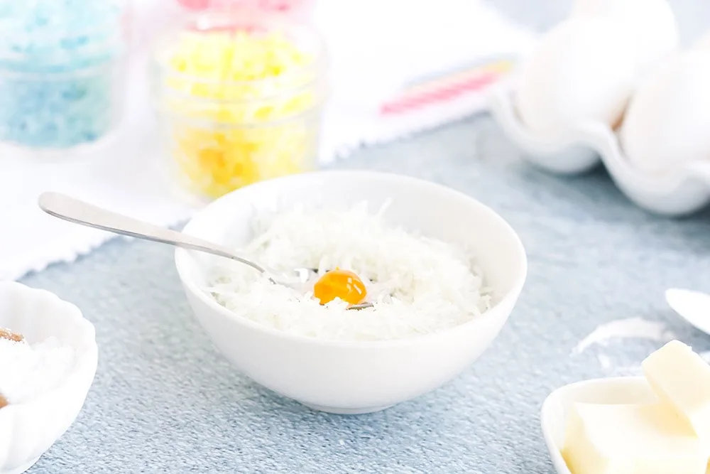 Shredded coconut with yellow food coloring.