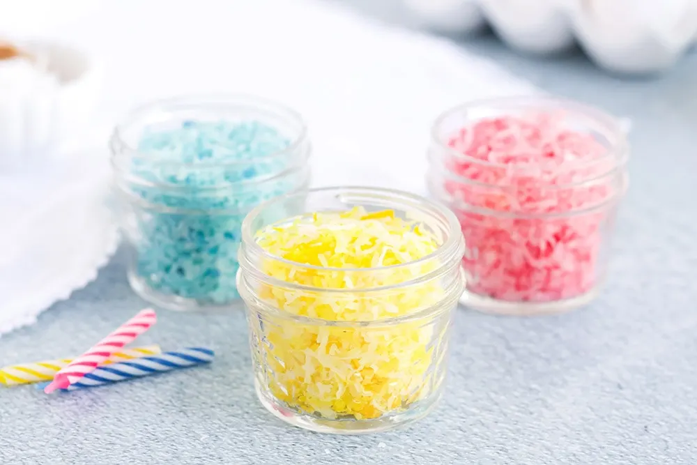 3 jars of colored shredded coconut.