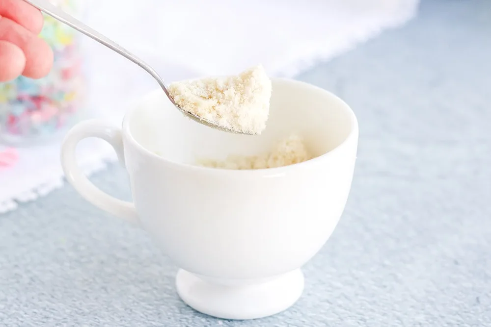Almond flour in a mug.