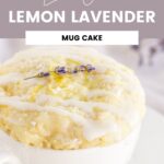 lemon mug cake in a mug with glaze and lavender on top