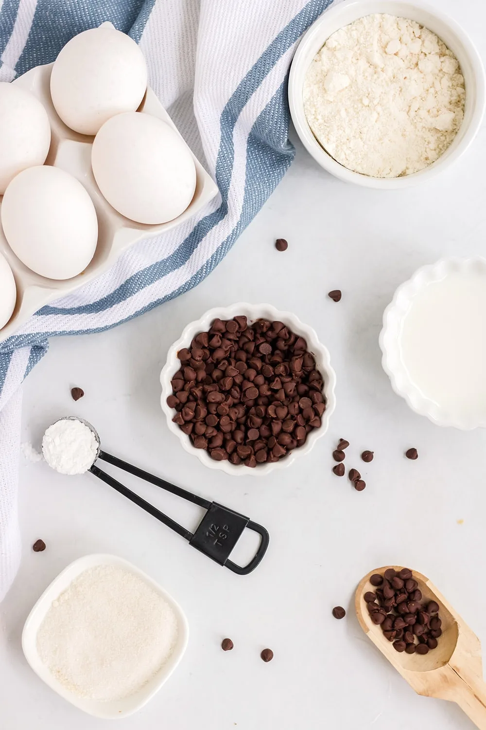 Overhead shot of ingredients for low-carb chocolate chip mug cake.