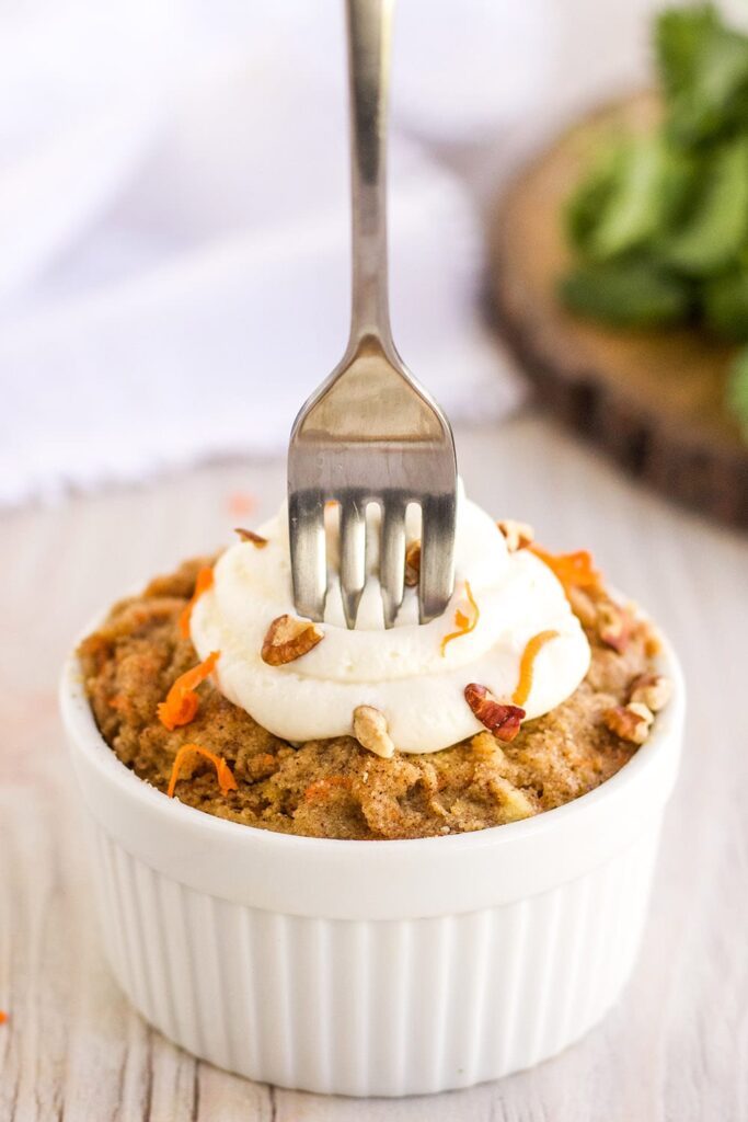 Fork stuck in a low-carb carrot mug cake