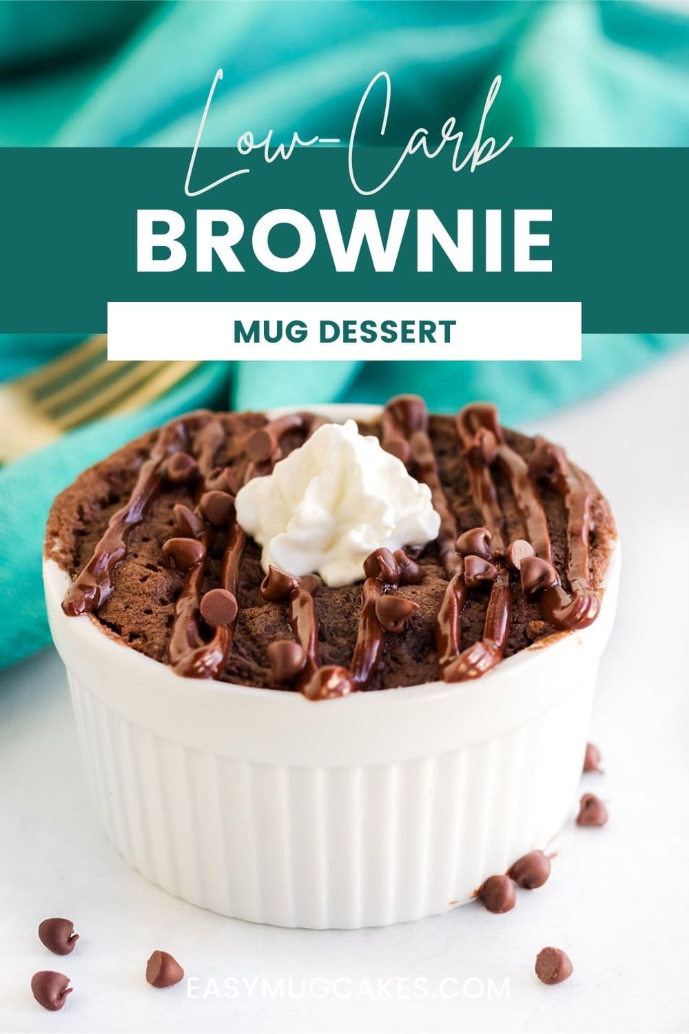 Brownie in a mug with whipped cream and chocolate chips.